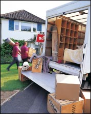 Movers Unloading a Truck